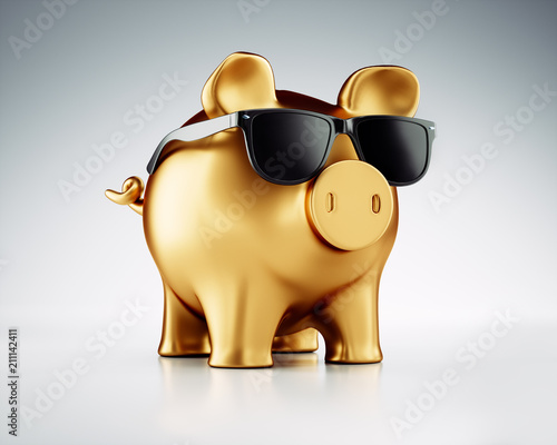 Goldenes Sparschwein mit Sonnenbrille photo