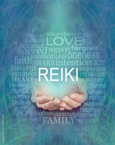 Fototapeta Naklejka Na Ścianę i Meble -  REIKI words of wisdom word cloud -  female cupped hands with the word REIKI floating above surrounded by a relevant word tag cloud on a flowing blue green ethereal background
