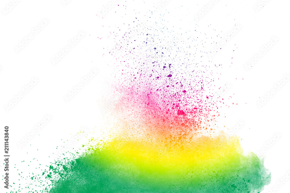 Abstract multi color powder explosion on white background.  Freeze motion of  dust  particles splashing. Painted Holi in festival.