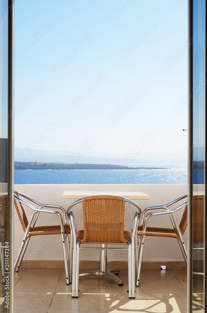 chair at balcony with sea view - Сrete, Greece