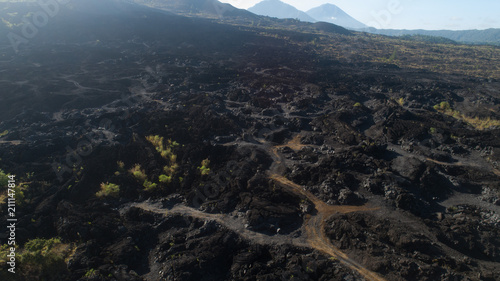 Aerial drone view of volcanic rocky landscape in Bali, Indonesia
