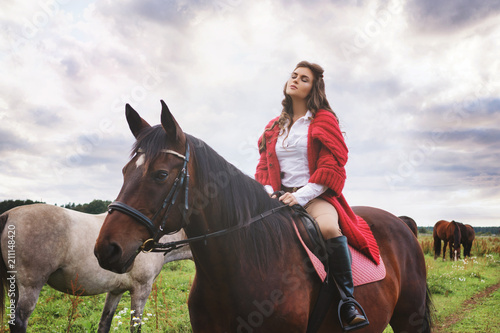 Young woman rider and her beautiful horse © blackday