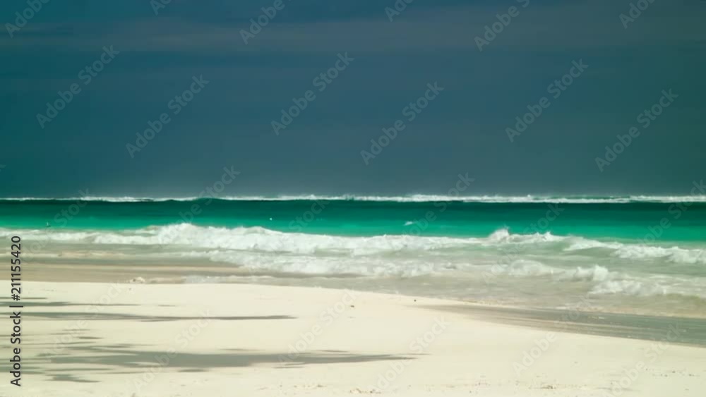 View of waves in the beach at Tulum, Mexico View of waves in the beach at Tulum, Mexico