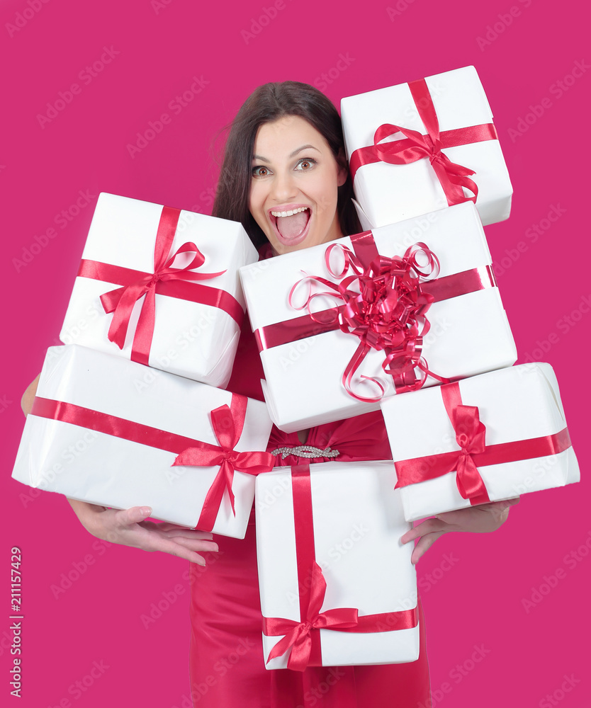 happy pretty woman holding many boxes with presents. happy pretty woman holding many boxes with presents.