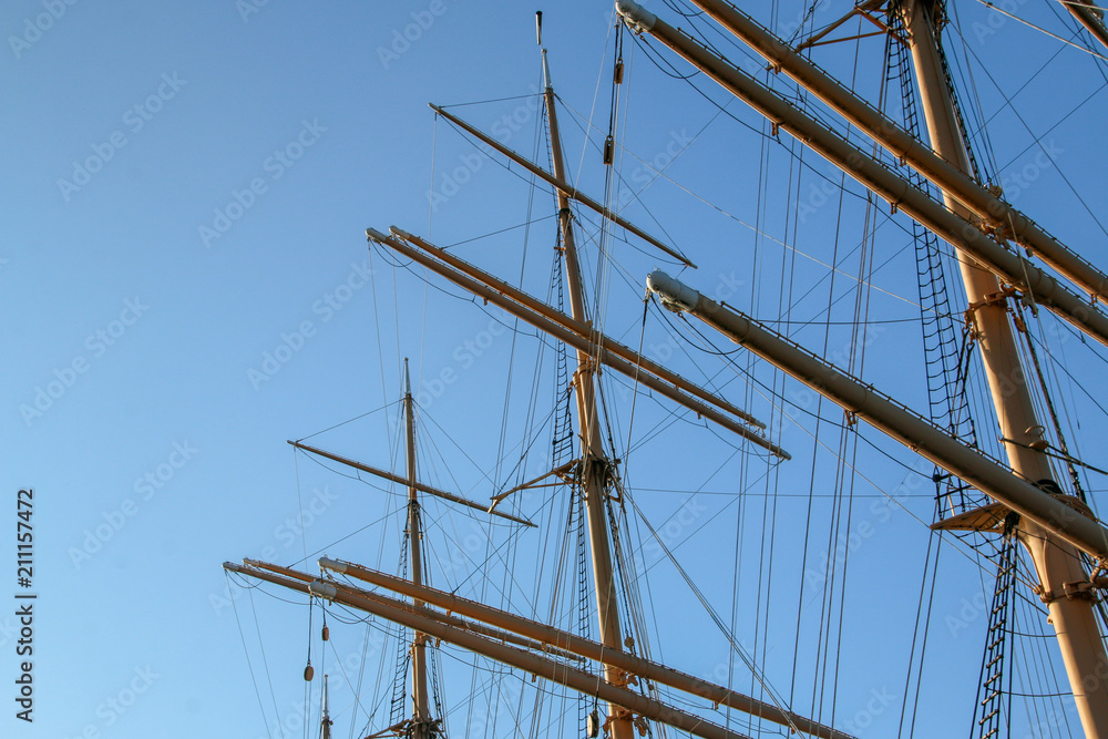 Masts of a sailing boat on a blue sky Masts of a sailing boat on a blue sky