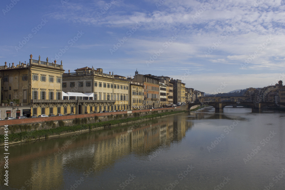 Florence cityscape on Arno river at day time, Italy