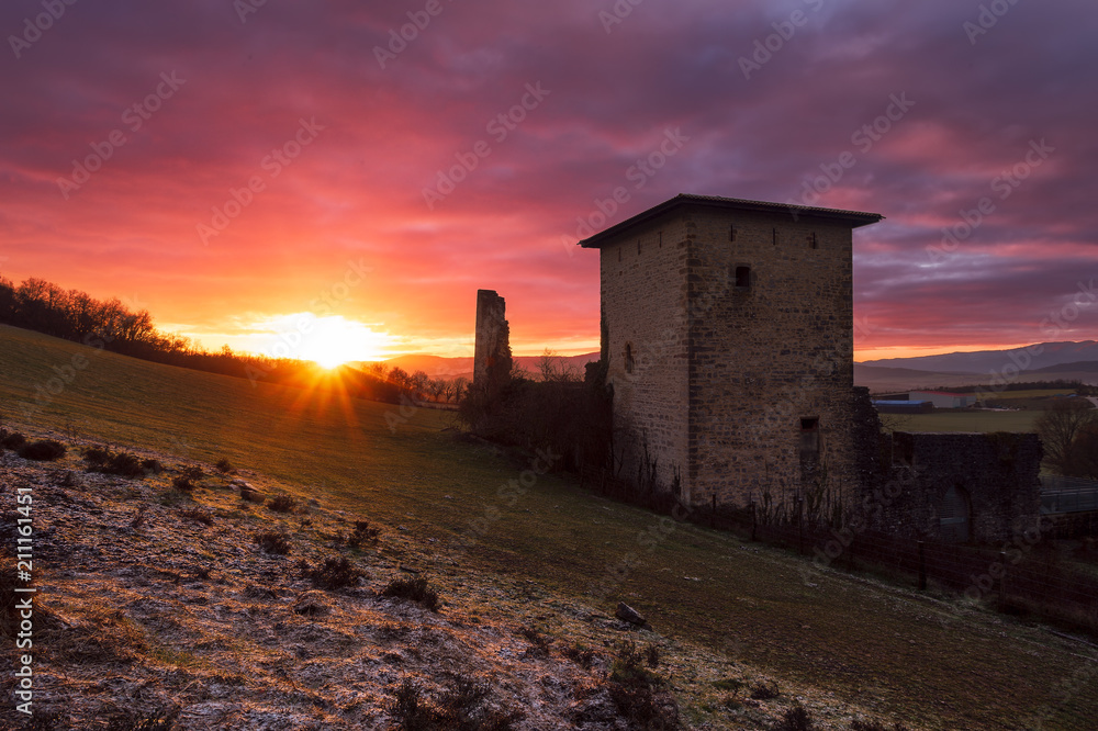 Ancient Gebara tower in Alava, Spain, at sunrise in a cold day