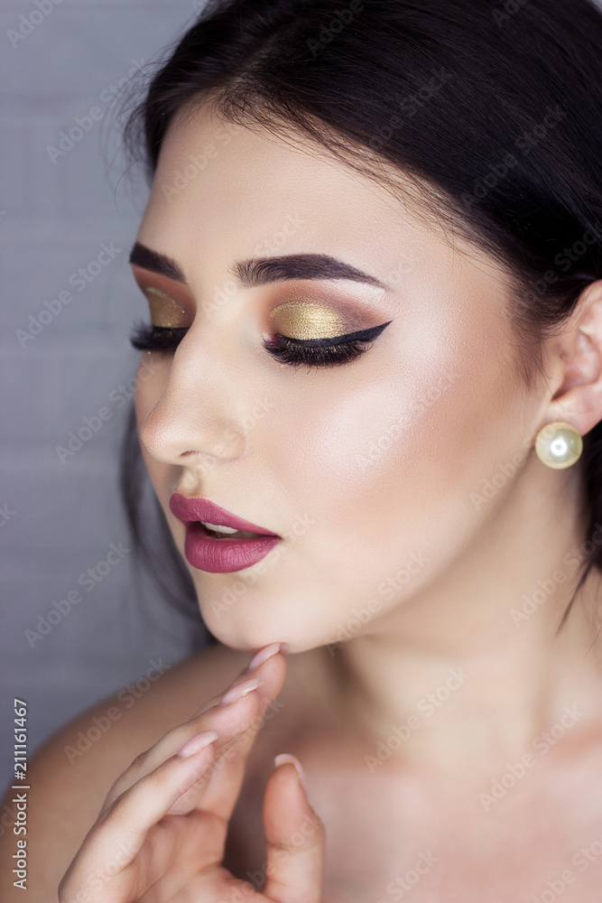 Beautiful brunette with professional make-up Beautiful brunette with professional make-up