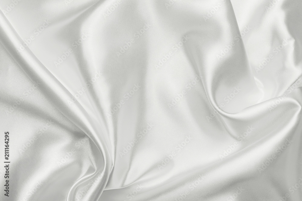 Elegant white satin silk with waves, abstract background