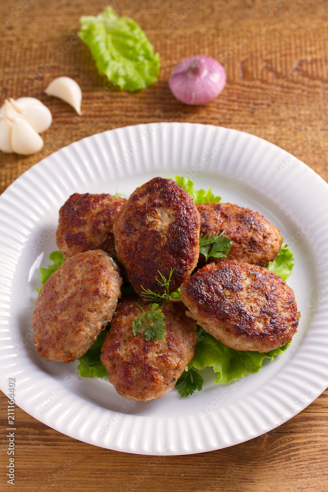 Delicious homemade burgers or cutlets. vertical Delicious homemade burgers or cutlets. vertical