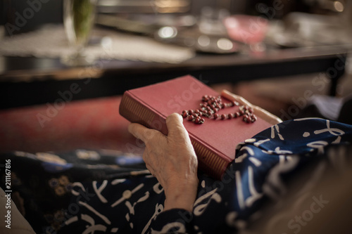 Grandmother praying.