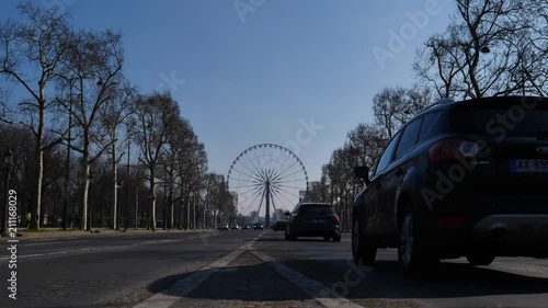 Street of Paris with Big Wheel in the background, Paris. photo