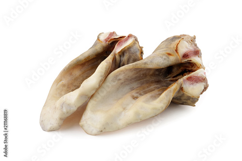 raw cow ears on white background isolated