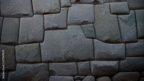 Ancient inca stone wall in the city of Cusco, Peru photo