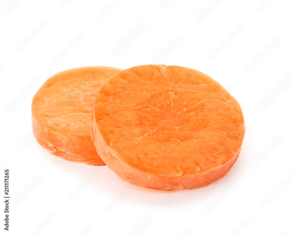 Ripe sliced carrot on white background Ripe sliced carrot on white background