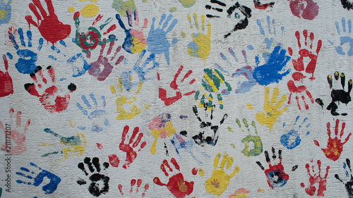 Colorful hand prints on the wall