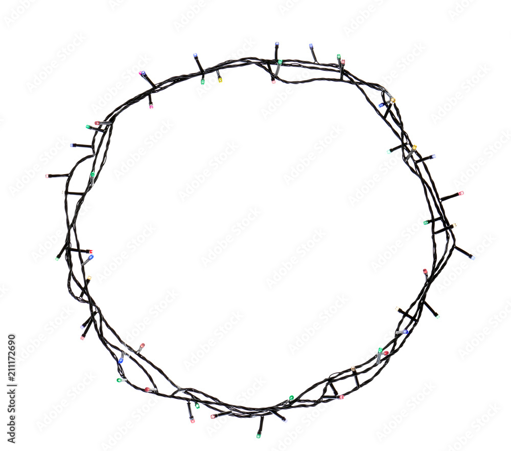 Frame made of Christmas lights on white background, top view