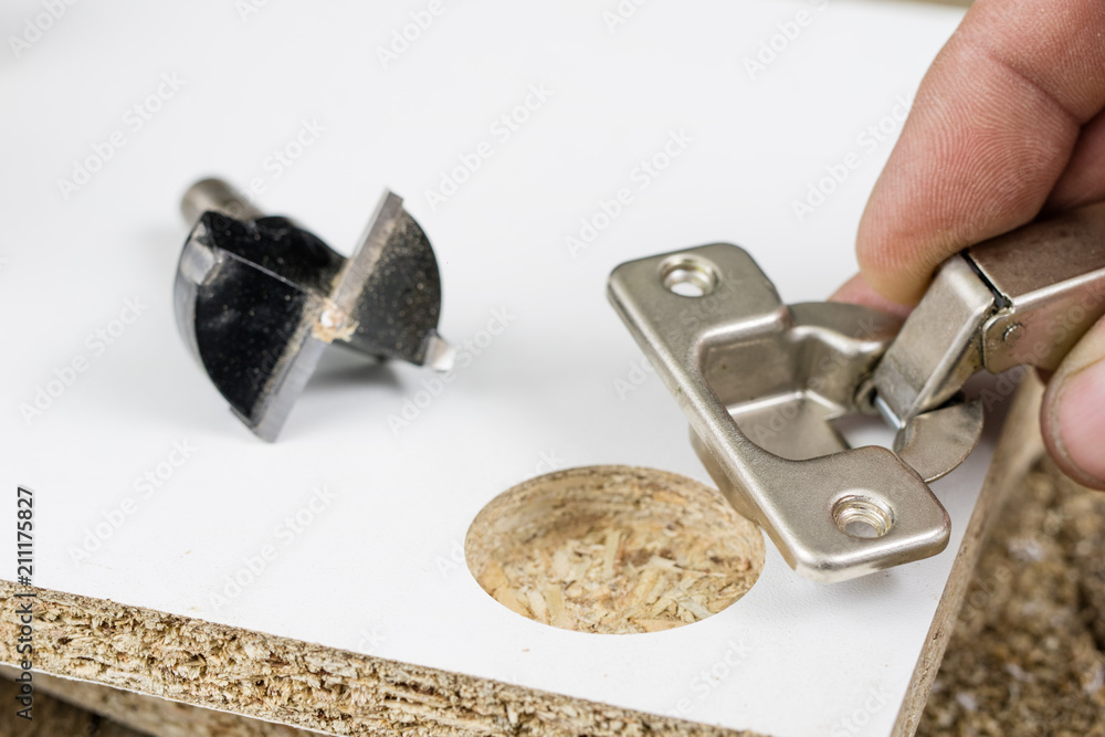 Milling cutter for fixing hinges in chipboard. Joinery accessories for furniture construction. Milling cutter for fixing hinges in chipboard. Joinery accessories for furniture construction.