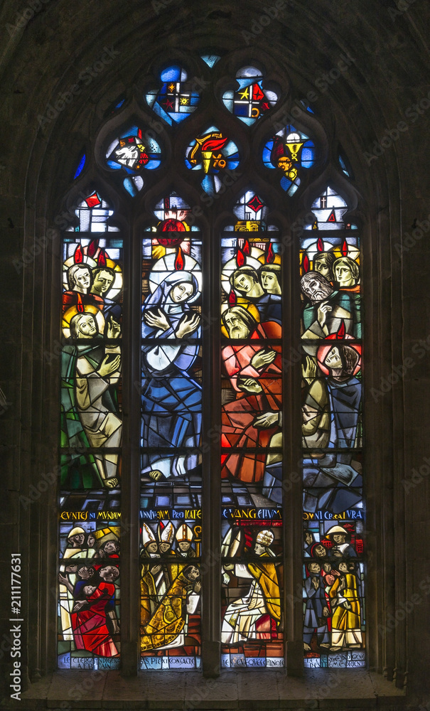 Colored stained glass window found in the interior of the Saint-Malo church in France