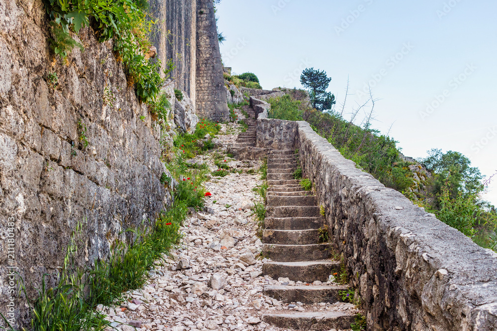 Stone road in the fortress wall of Kotor city, Montenegro