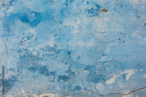Blue old rustic wall in cracks