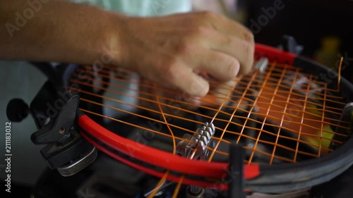 Tennis racquet stringing