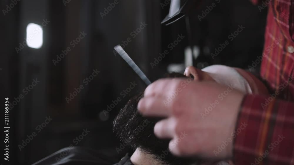 Emotional man with mustaches and beard, hipster portrait in barber shop Emotional man with mustaches and beard, hipster portrait in barber shop