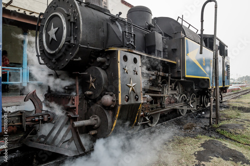 Old steam locomotive train and smoke, Nilgiri Mountain Railway, Ooty, Tamil Nadu, India
