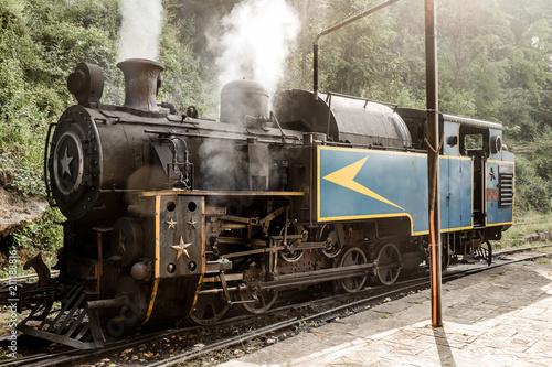 Old steam locomotive train and smoke, Nilgiri Mountain Railway, Ooty, Tamil Nadu, India