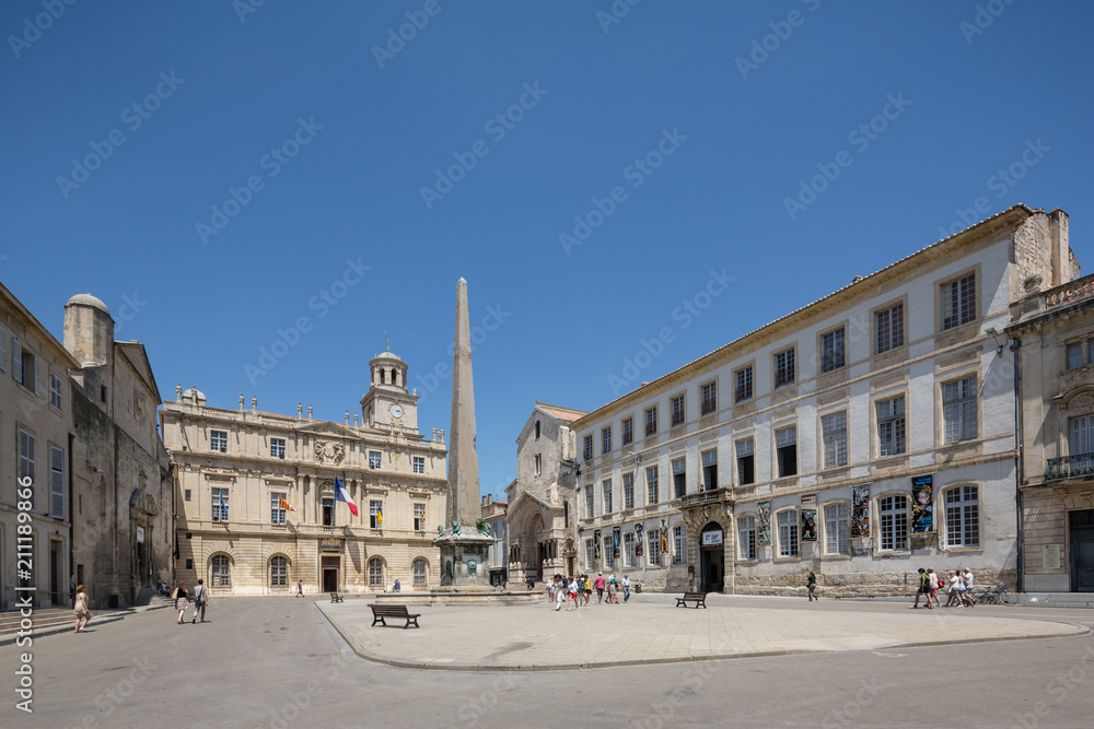 Arles Old Town with the Town Hall, Clock Tower, the roman Obelisk and medieval church, Provence, France