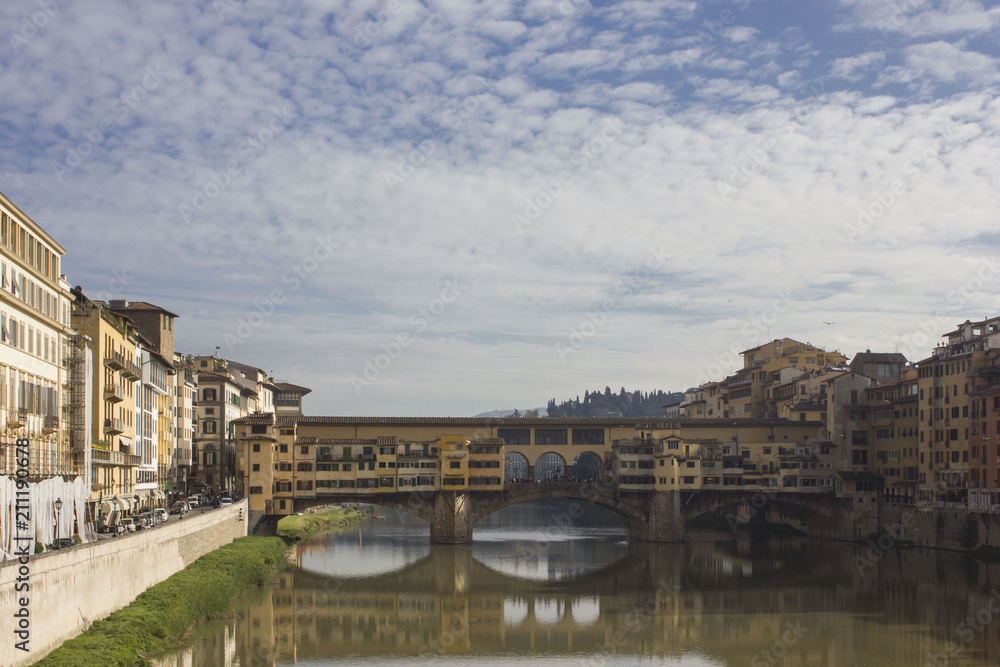 Day view of historic Ponte Vecchio bridge in Florence, Italy