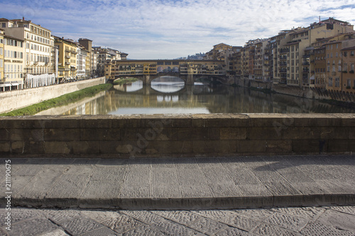 Day view of historic Ponte Vecchio bridge in Florence, Italy photo