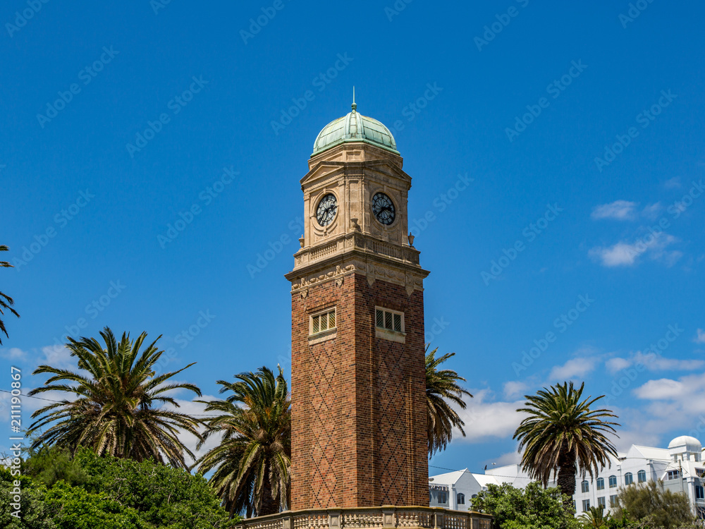 Fototapeta premium Clock Tower Against a Blue Sky in Melbourne, Australia