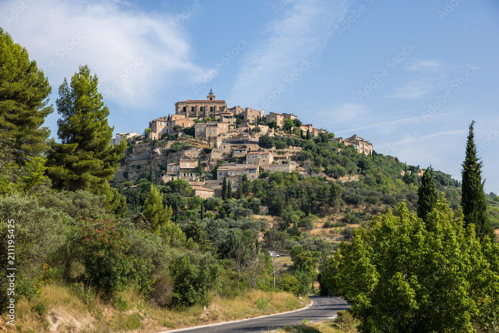 The medieval hilltop town of Gordes in Provence. France as seen from the road below
