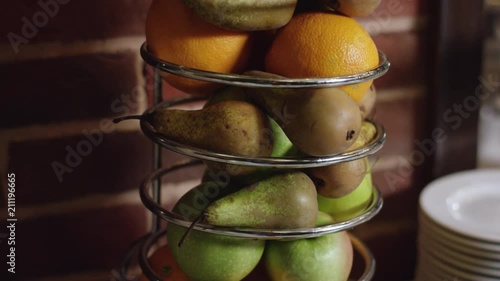 various fruits close-up to camera on the served table in buffet in the new hotel