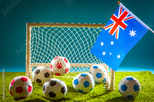 Flag of Australia. Football. Flag of Australia at the stadium. Football game. Australian national football team. Soccer ball in the stadium. Football pitch. photo