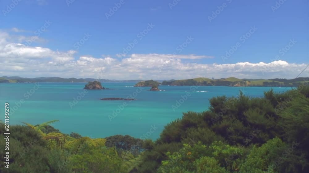 Zoom-in on Vibrant Green Hills and a Blue Bay Zoom-in on Vibrant Green Hills and a Blue Bay
