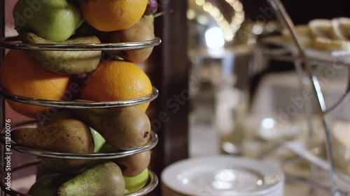 various fruits on the served table in buffet in the new hotel