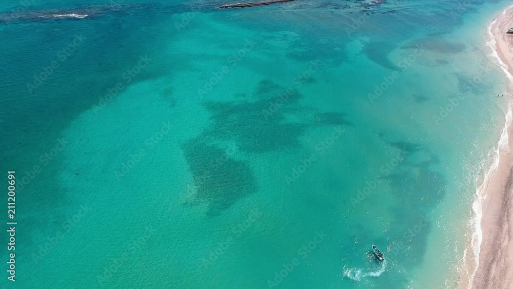 Aerial Pan View of the Sea and a Boat Aerial Pan View of the Sea and a Boat