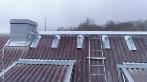 Wallpaper Mural 18326_The_tin_roof_of_the_house_with_some_snow_in_Valga_Estonia.mp4 Torontodigital.ca