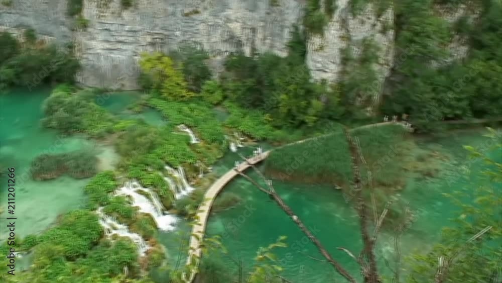 Pan Arial Pan of Waterfall Connected Lakes Pan Arial Pan of Waterfall Connected Lakes