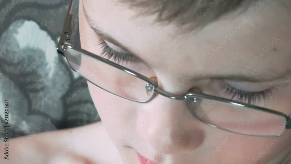 children's eyes with glasses close-up. children's eyes with glasses close-up.