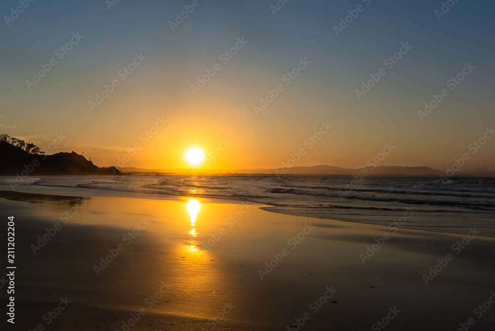 Beautiful sunset on the beach in Byron Bay, Australia.