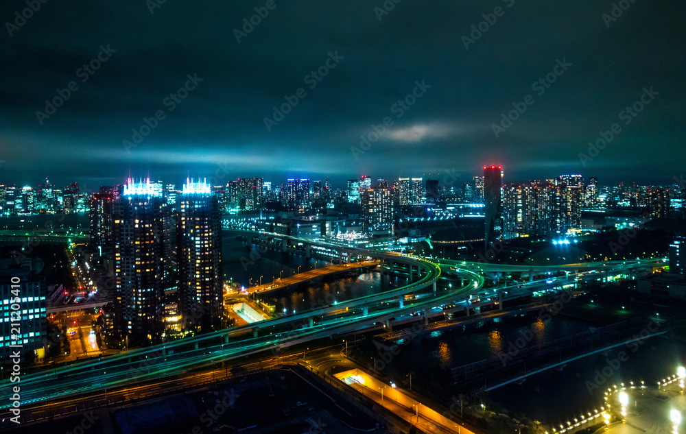 Obraz premium Aerial view over Tokyo by night - beautiful city lights