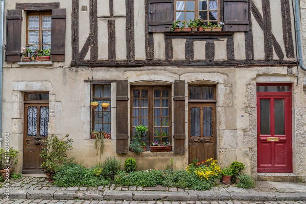 Obraz premium Noyers sur Serein, France May 17th 2013 : Beautiful timber framed cottage in Noyers sur Serein