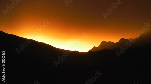 Zoom-Out: Intense Sun Rays Over Tibetan Ruin photo