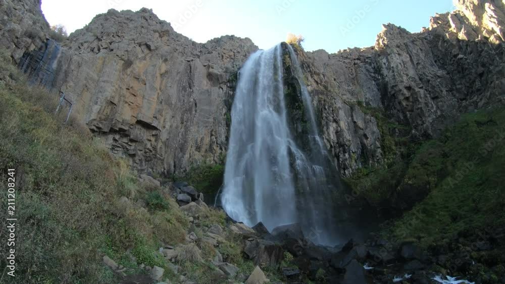 Detail of La Fragua waterfall in Manzano Amargo, Neuquen, Patagonia Argentina. At sunset. Autumn scene. Camera panning sideways and stays still. Detail of La Fragua waterfall in Manzano Amargo, Neuquen, Patagonia Argentina. At sunset. Autumn scene. Camera panning sideways and stays still.