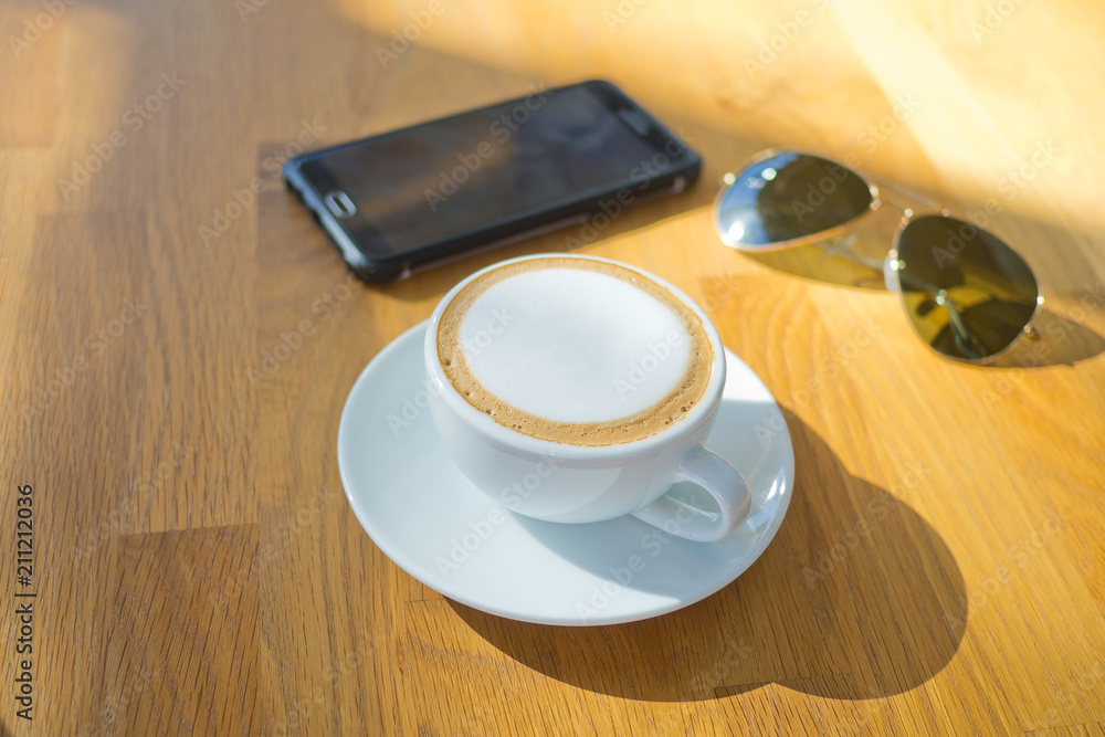 Obraz premium hot coffee cup on table at morning. relax time