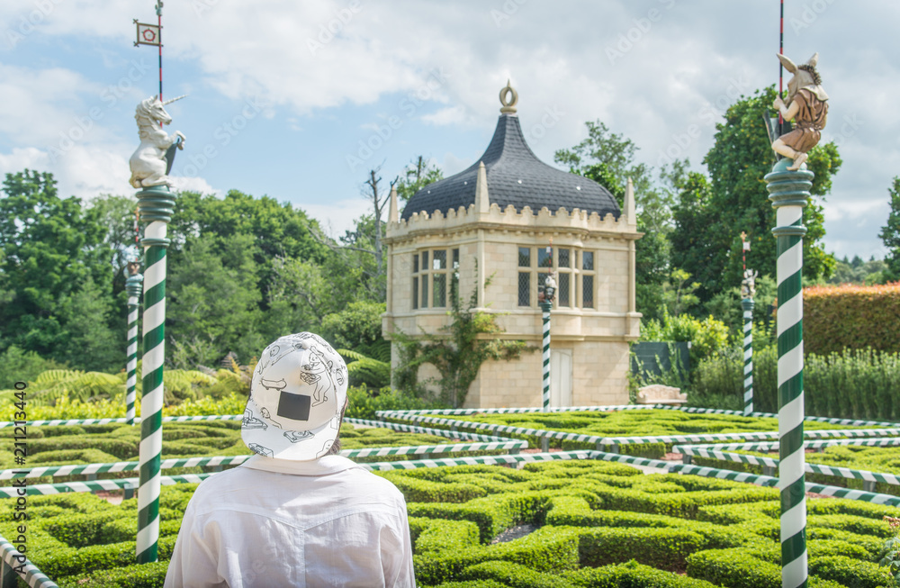 Tourist visiting Tudor garden mythical beasts in Hamilton gardens an