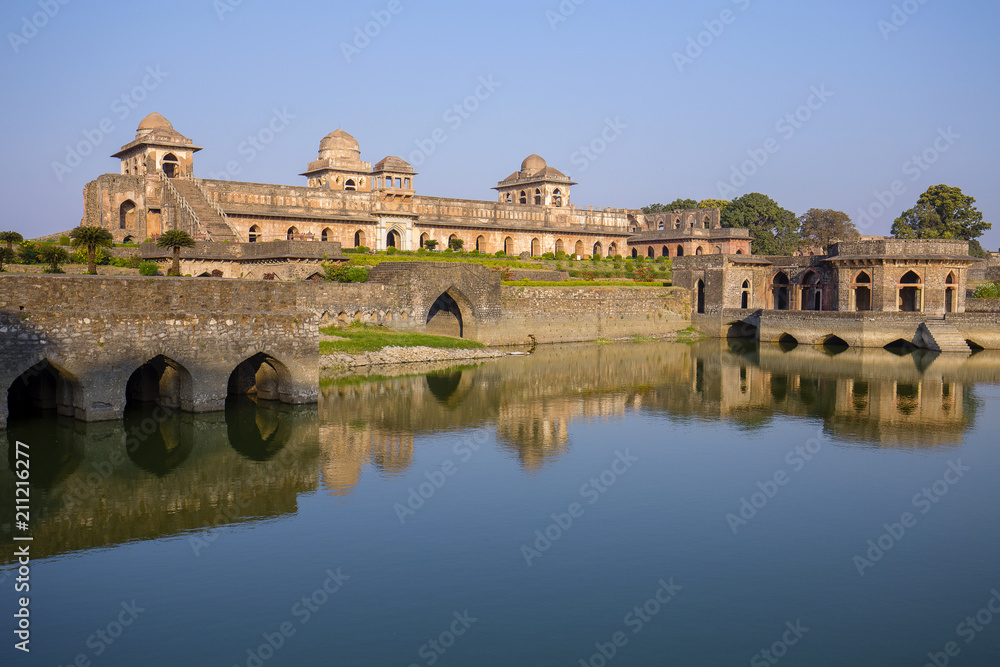 Jahaz Mahal , Ship Palace and blue water lake in sunrise. Mandu, Madhya Pradesh, India Jahaz Mahal , Ship Palace and blue water lake in sunrise. Mandu, Madhya Pradesh, India